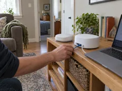 Illustrative scene of checking a mesh router and Ethernet connection in a home